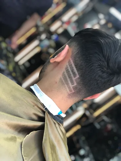 Hair design pattern cut at Class Barber
